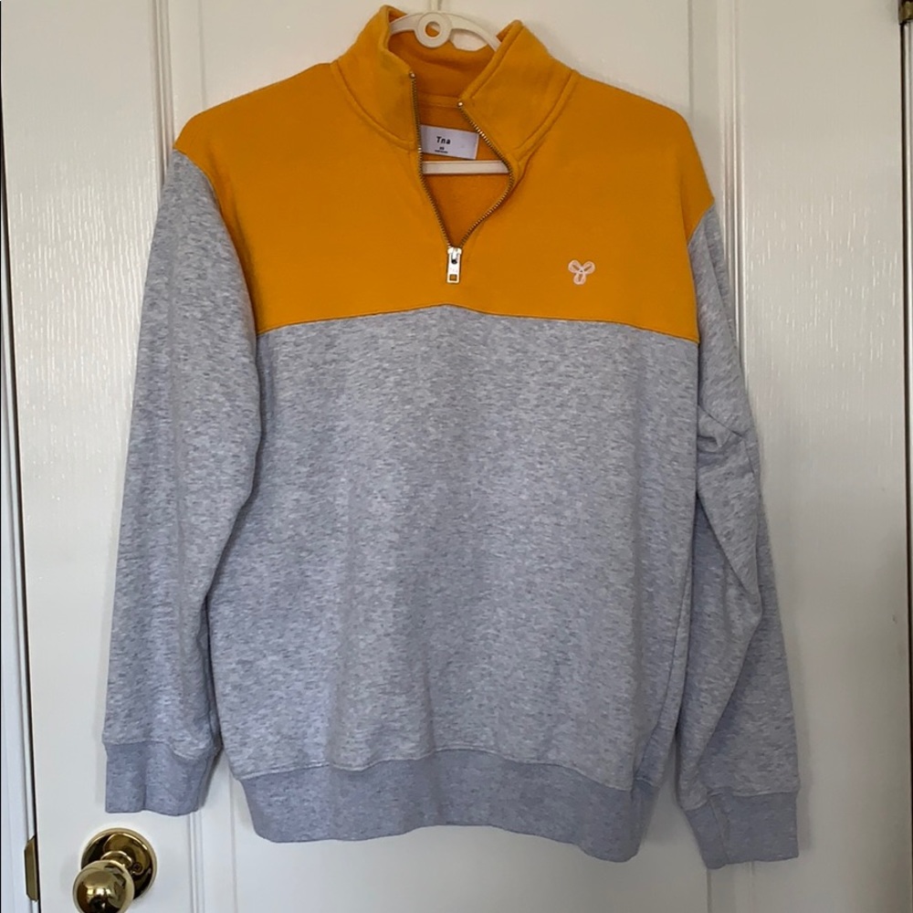 TNA the warmup sweater